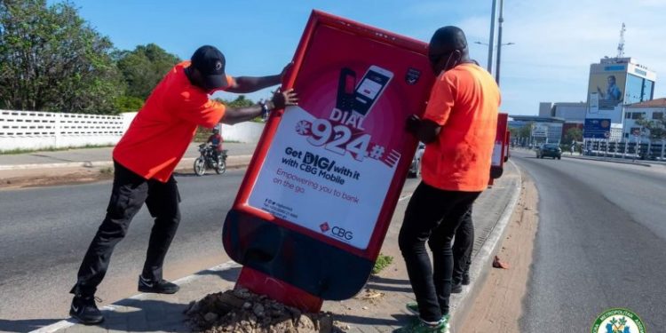 AMA removes unauthorised signages along the High Street in Accra