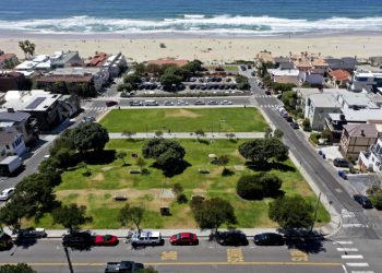 A Black family lost their beach land 100 years ago. This fall, they may finally get it back.