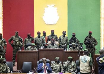 Guineans Hoot At ECOWAS Chair & Delegation; Check Out What They Wrote On Placards For Them