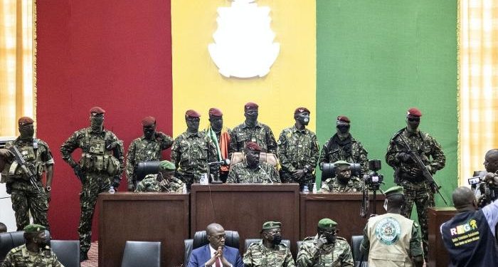 Guineans Hoot At ECOWAS Chair & Delegation; Check Out What They Wrote On Placards For Them