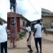 Electricity Company Worker Falls To The Ground As Residents Push His Ladder