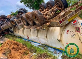 Heavy Tanker Transporting Fuel To Burkina Summersaults; Causes Massive Fuel Spillage On The Road