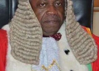 Retired judge found dead in car