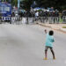 #OccupyJulorbiHouse: Photo of boy vs. riot police hailed as symbol of resistance