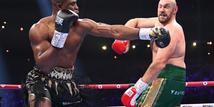 Tyson Fury escapes shock upset as Francis Ngannou is robbed of win after knock down