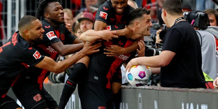 Bayer Leverkusen win first Bundesliga title