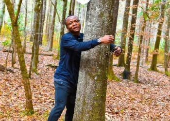 Guinness World Records: Ghanaian activist hugs over 1,100 trees in an hour to set record
