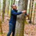 Guinness World Records: Ghanaian activist hugs over 1,100 trees in an hour to set record