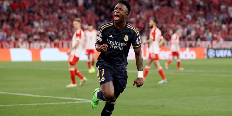 Vinicius Jr’s double earns Real Madrid 2-2 draw at Bayern