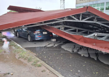 2 escape death narrowly after being trapped under falling roofing in Wednesday’s rainstorm