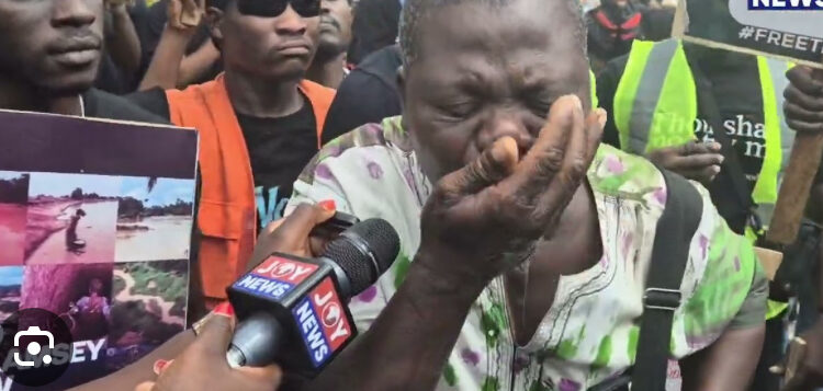Protester drinks galamsey water, kneels and send powerful plea to Akufo-Addo