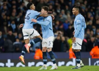 Man City scrape into Champions League knockouts with comeback win over Brugge