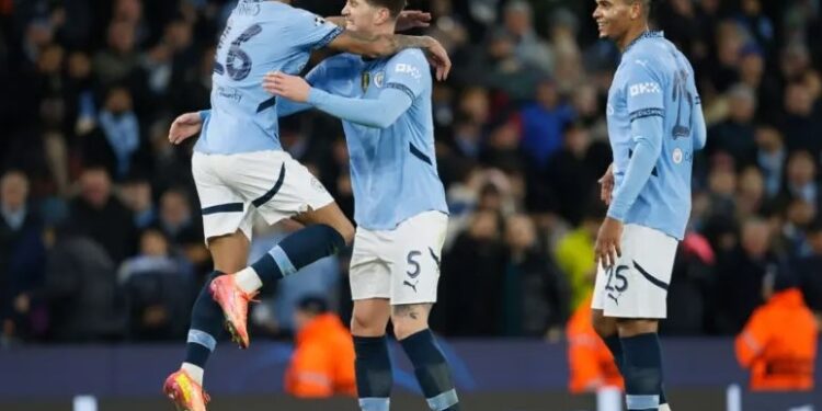 Man City scrape into Champions League knockouts with comeback win over Brugge