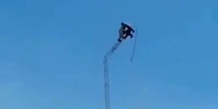 Horror moment transmission tower collapses with two workers strapped to the top sending them falling to their deaths