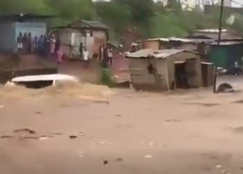 STC bus swept away by floodwaters at Achimota–Abofu