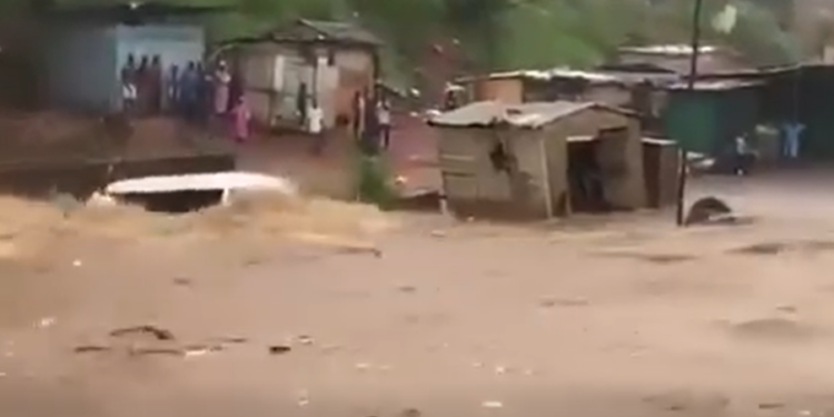 STC bus swept away by floodwaters at Achimota–Abofu